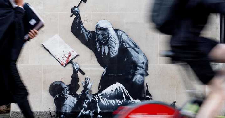 New Banksy mural removed a day after appearing on courthouse