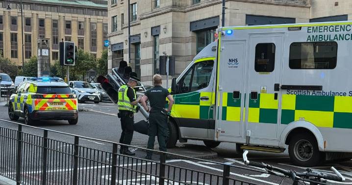 Edinburgh road shut as ambulance 'ploughs into traffic light' on city centre street