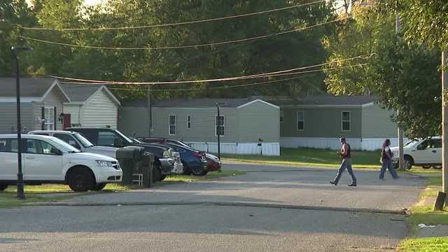 Valley Station neighbors on edge after woman found dead; husband arrested