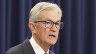 Fed cuts rates as job gains plunge