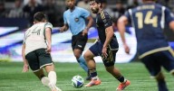 Brian White's late goal gives Whitecaps a draw with Portland