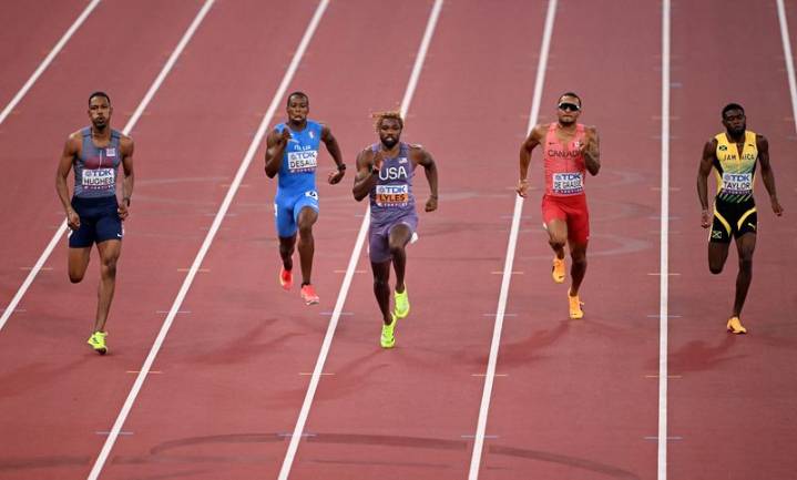 Athletics-Lyles makes smooth start to 200m bid