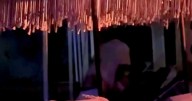 Brazen couple get frisky on deckchairs in Mykonos just metres from a busy beach club
