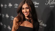 Bronzed ‘SI’ Swim model flaunts chiseled abs in ‘micro’ string bikini