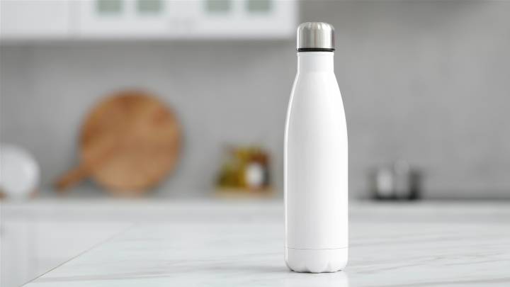 Why You Should Never Store Water Bottles In A Kitchen Cabinet