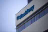 BlackBerry reports Q2 profit compared with loss a year ago, raises guidance