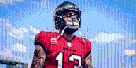 His father's murder drove Mike Evans to the NFL, a 'big brother' taught him how to stay there