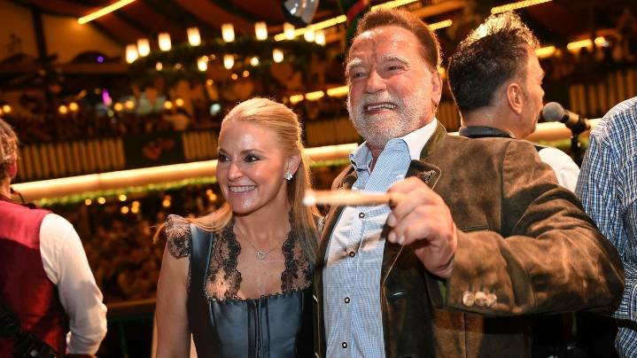 Schwarzenegger directs a band in a beer tent at Munich's Oktoberfest