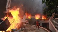 Nepal PM quits after protesters torch political leaders' homes, 19 killed