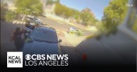 Car washers held at gunpoint during Woodland Hills robbery