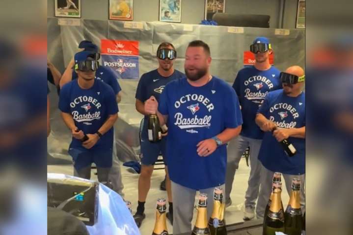 Toronto Blue Jays celebrate playoff berth with champagne
