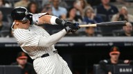 Yankees keep pace with Jays as Stanton hits 2 HRs, Judge blasts No. 52