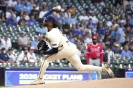 Peralta wins his NL-best 17th, Yelich goes deep and the Brewers beat the Angels 9