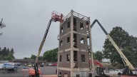 Apprentices donate their time to dismantle old Gresham Fire training tower