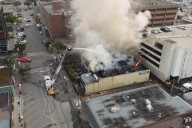 Driver flees scene after crash with ambulance, brewery burned down in Prince George