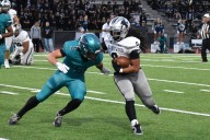 Kentwood’s offense explodes as the Conks dominate Auburn Riverside