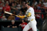 Deadspin | Athletics take control late to defeat Reds