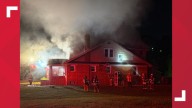 Part of River Road closed as emergency crews battle fire at Maumee home