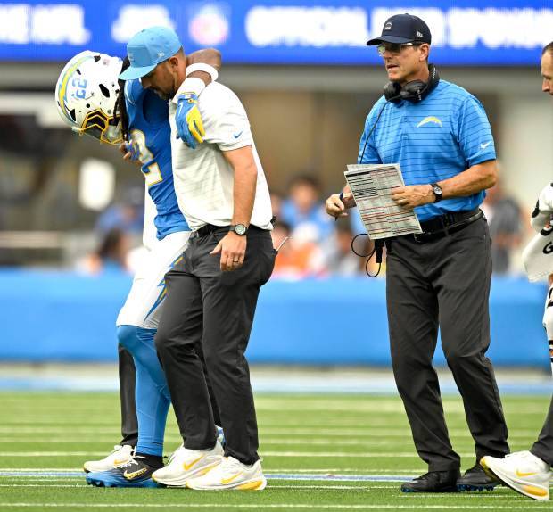 Chargers’ Najee Harris helped off field after injuring ankle against Broncos