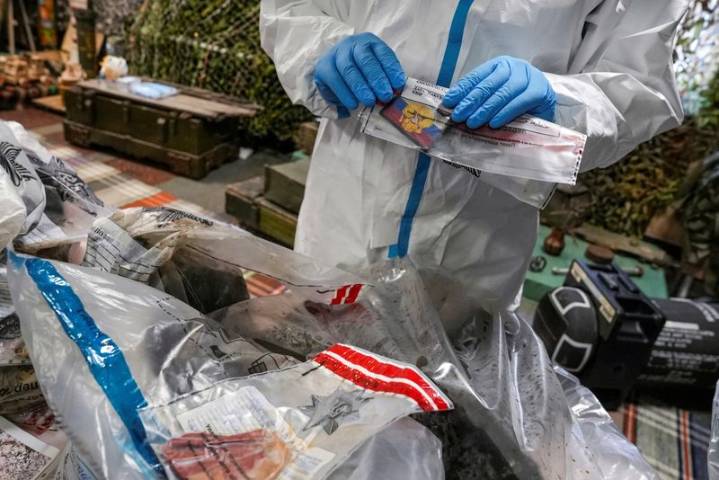 Ukraine struggles to identify thousands of soldiers’ remains as relatives ache for news
