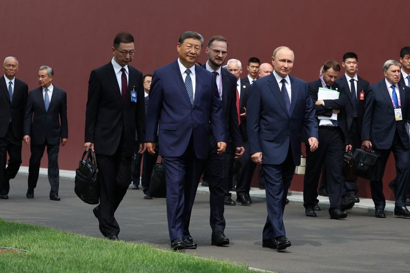 China's Xi hosts 'old friend' Putin, North Korea's Kim in challenge to West