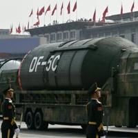 Beijing shows off drones, missiles and lasers in military parade