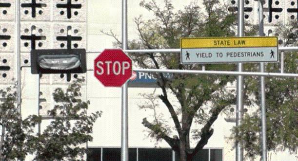 Conversion of Albuquerque intersections to four
