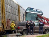 Freight train slams into a bus outside Mexico City and kills at least 10 people