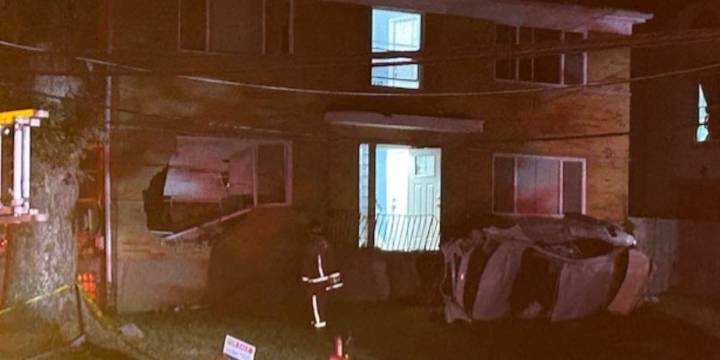 Vehicle crashes into building, 2nd car split in half