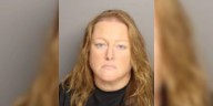 Elementary school employee charged with incest, officials say