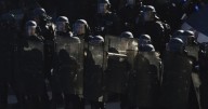 Strikes and protests roil France, pitting the streets against Macron and his new prime minister
