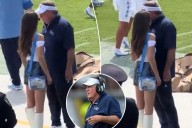 Jordon Hudson chats with Bill Belichick before North Carolina's loss to UCF