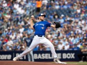 Rookie Trey Yesavage earns his first big-league win in leading Jays