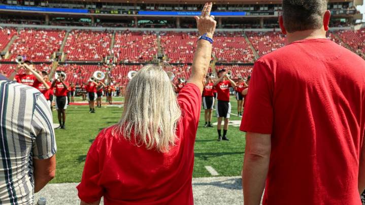 'I knew my story was not over, and God wasn't finished with me.' | Cancer survivors honored at UofL football game