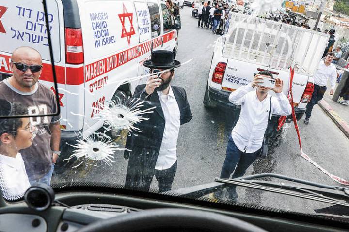 Gunmen attack bus stop in Jerusalem, killing at least 6