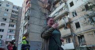 Ukraine government building damaged in Kyiv in the largest Russian attack since the war began