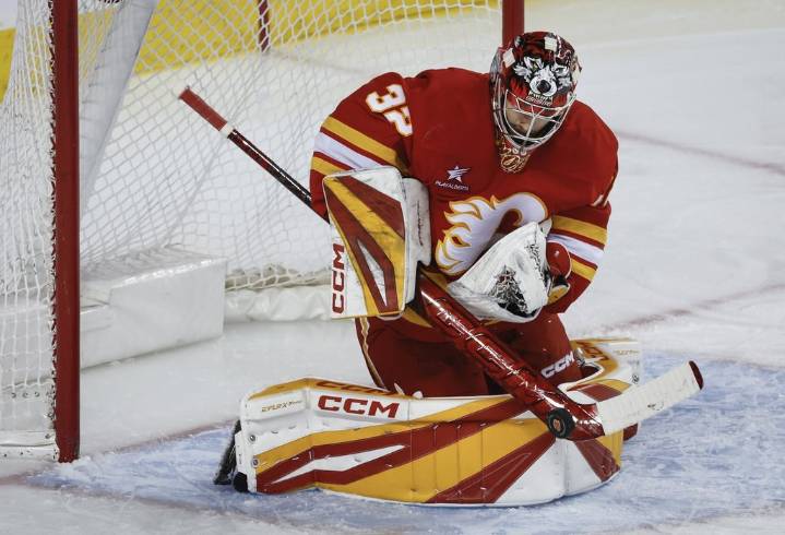 Flames sign goalie Dustin Wolf to seven-year, US$52.5-million contract extension – Winnipeg Free Press
