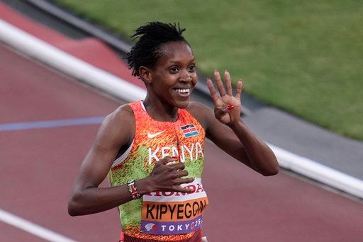 Kipyegon wins in a breeze for fourth world title at 1,500 meters