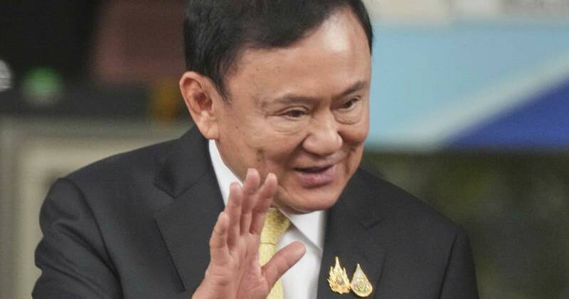 Ex-PM Thaksin returns to Thailand before court ruling