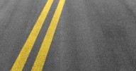 Driver hits parked camper on northern Minnesota highway, injuring woman who was checking it