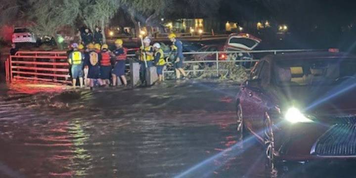 2 rescued from cars trapped in flooded Phoenix wash