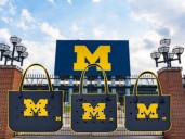 Michigan’s most coveted campus accessory is back in stock: Wolverine Bogg Bags now available in all three sizes