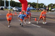 Runners race to honor fallen Suffolk police dispatcher in annual 5K