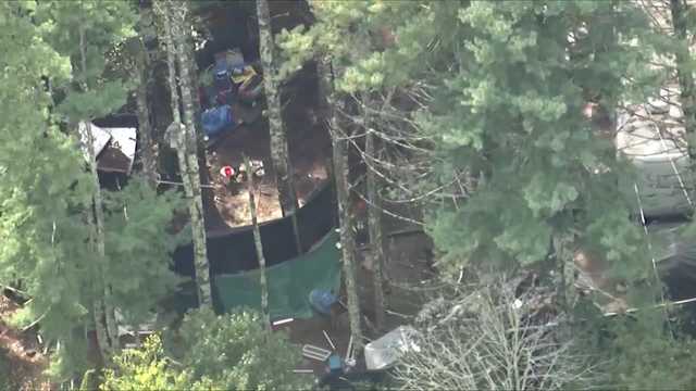 Man dies, woman hospitalized after being found on property tied to recent murder
