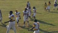 Community reacts after metro Atlanta youth football coach arrested for allegedly slamming young player into ground, needing airlift to hospital