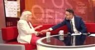BBC Breakfast's Jon Kay pauses interview to comfort guest as they get emotional