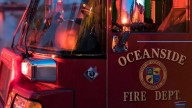 Four people rescued off of the coast in Oceanside after their boat was swept into the surfline