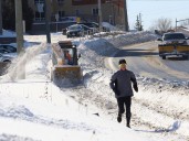 City mulls extending sidewalk snow