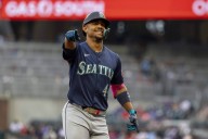 Rodríguez hits 2 homers, Raleigh gets his 52nd, and Mariners down Braves 10