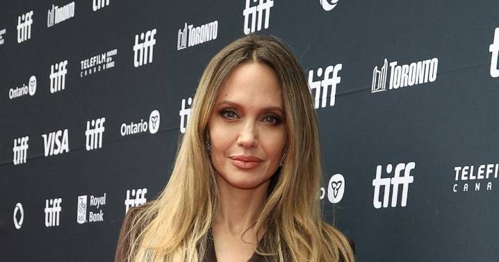 Angelina Jolie Wears Nothing Under Her No Pants Power Coat